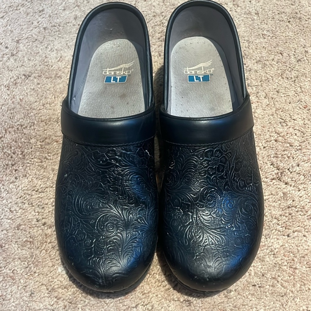 Dansko black tooled leather clogs size 41 ( 10). Barely worn, super comfy.